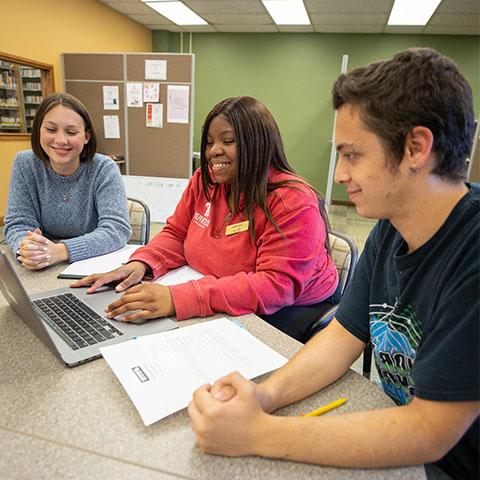 Students work in the Writing Center